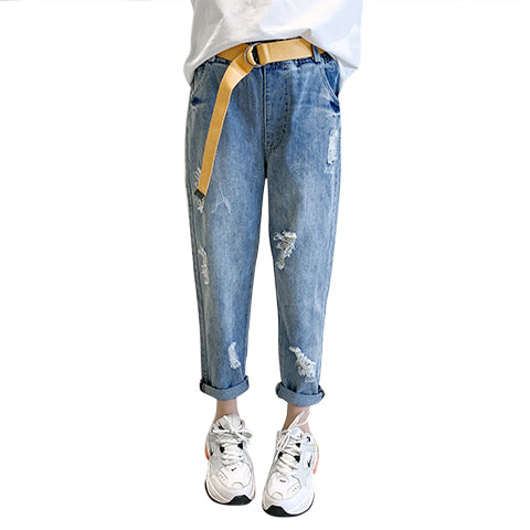 Jeans in denim blu con foro elegante da ragazza 