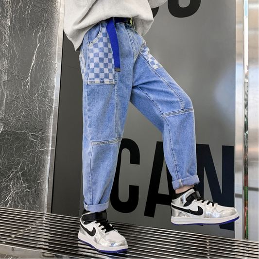 Pantaloni jeans larghi elastici blu alla moda da ragazzo 